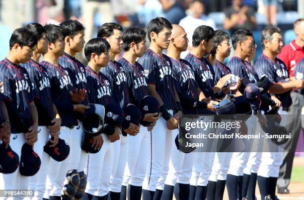 The team of Japan stands for the national anthem during the Haarlem Baseball Week game between Chinese Taipei and Japan at the Pim Mulier...