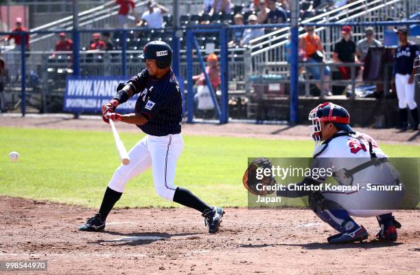 Hayata Fujino of Japan hits the ball in the third inning during the Haarlem Baseball Week game between Chinese Taipei and Japan at the Pim Mulier...