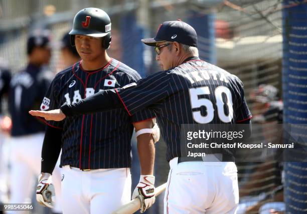 Manager Tsutomu Ikuta of Japan gives instructions to a player during the Haarlem Baseball Week game between Chinese Taipei and Japan at the Pim...
