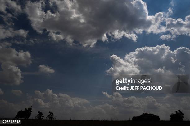 Netherlands' Marco Minnaard and France's Fabien Grellier ride during their two-men breakaway in the eighth stage of the 105th edition of the Tour de...