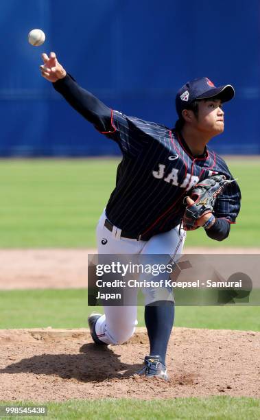 Hiroshi Kaino of Japan pitches in the nineth inning during the Haarlem Baseball Week game between Chinese Taipei and Japan at the Pim Mulier...