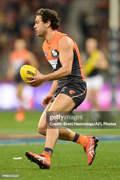 Tim Taranto of the Giants passes the ball during the round 17 AFL match between the Greater Western Sydney Giants and the Richmond Tigers at Spotless...