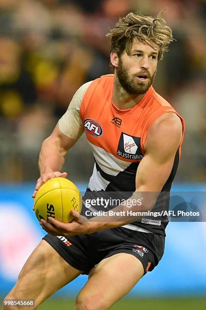 Callan Ward of the Giants passes the ball during the round 17 AFL match between the Greater Western Sydney Giants and the Richmond Tigers at Spotless...