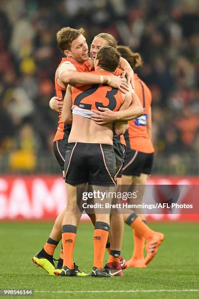 Giants players celebrate victory during the round 17 AFL match between the Greater Western Sydney Giants and the Richmond Tigers at Spotless Stadium...