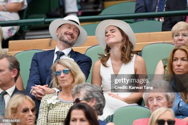 John Vosler and Emma Watson attends day twelve of the Wimbledon Tennis Championships at the All England Lawn Tennis and Croquet Club on July 13, 2018...