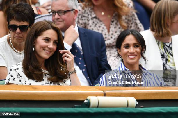 Catherine, Duchess of Cambridge and Meghan, Duchess of Sussex attend day twelve of the Wimbledon Lawn Tennis Championships at All England Lawn Tennis...