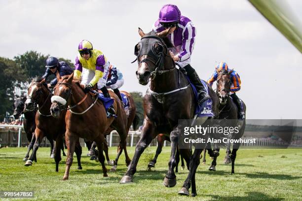 Ryan Moore riding US Navy Flag win The Darley July Cup at Newmarket Racecourse on July 14, 2018 in Newmarket, United Kingdom.