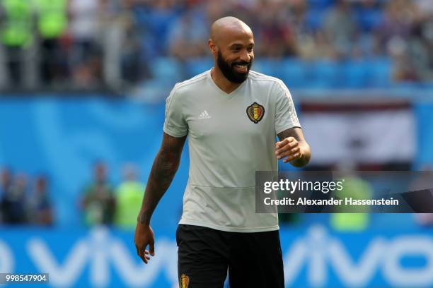 Belgium assistant coach Thierry Henry looks on during the warm up prior to the 2018 FIFA World Cup Russia 3rd Place Playoff match between Belgium and...