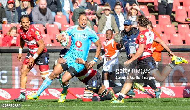 Johnny Kotze of the Bulls with possession against the Lions during the Super Rugby match between Emirates Lions and Vodacom Bulls at Emirates Airline...
