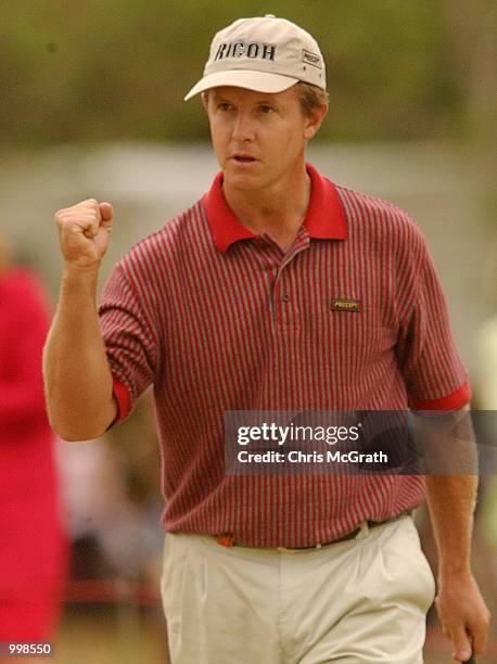 Scott Laycock of Australia celebrates after making a birdie on the 18th to take the outright lead during the second round of the Holden Australian...