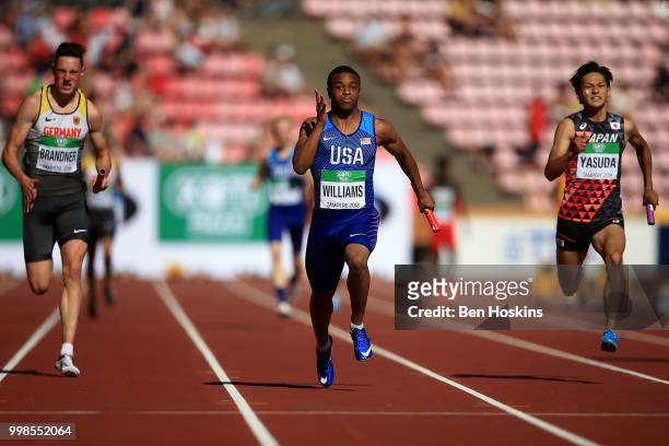 Micah Williams of The USA races for the finish line on his way to winning The USA gold in the final of the men's 4x100m on day five of The IAAF World...