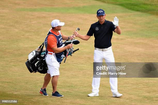 Marcel Siem of Germany reacts to his second shot on hole one during day three of the Aberdeen Standard Investments Scottish Open at Gullane Golf...