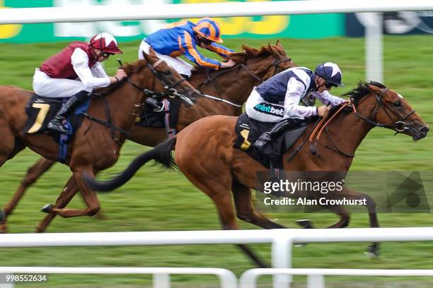 Harry Bentley riding Antonia De Vega win The Rossdales British EBF Maiden Fillies' Stakes at Newmarket Racecourse on July 14, 2018 in Newmarket,...