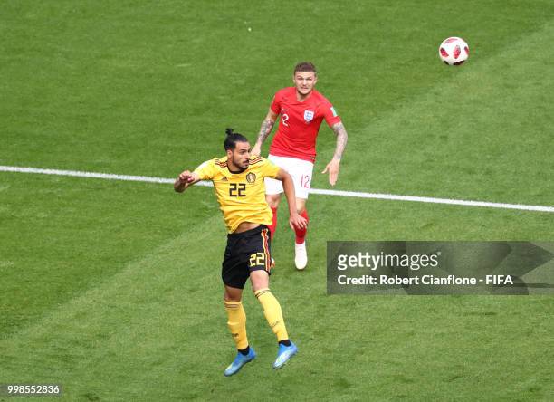 Nacer Chadli of Belgium wins a header from Kieran Trippier of England during the 2018 FIFA World Cup Russia 3rd Place Playoff match between Belgium...