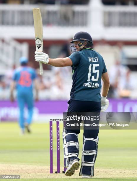 England's David Willey celebrates reaching his half century during the second Royal London one day international match at Lord's, London.