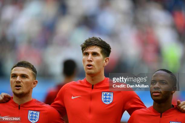 John Stones of England sings the national anthem prior to the 2018 FIFA World Cup Russia 3rd Place Playoff match between Belgium and England at Saint...