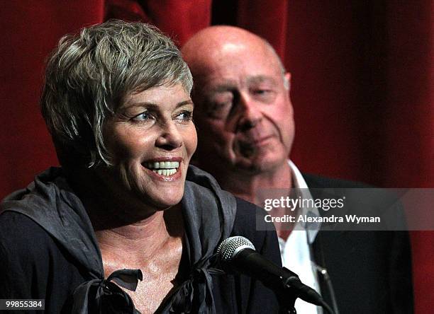 Actress Kelly McGillis and director Tony Scott speak onstage before the screening of "Top Gun" during AFI & Walt Disney Pictures' "A Cinematic...