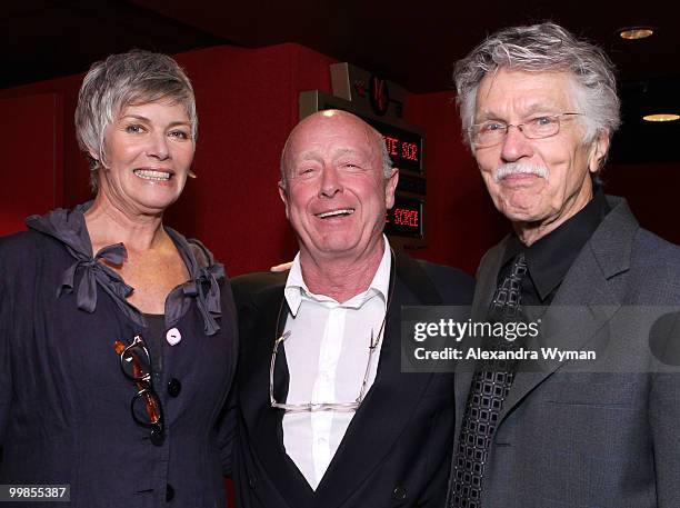 Actress Kelly McGillis, director Tony Scott, and actor Tom Skerritt pose onstage before the screening of "Top Gun" during AFI & Walt Disney Pictures'...