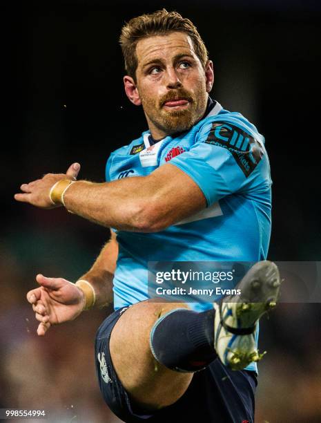 Bernard Foley of the Waratahs kicks the ball during the round 19 Super Rugby match between the Waratahs and the Brumbies at Allianz Stadium on July...