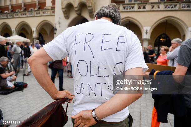 Man with a hand written t shirt saying Free Oleg Sentsov during the protest. Protest demanding the release of the Ukrainian filmmaker and writer,...