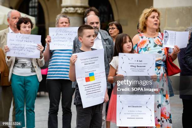 People seen holding posters during the protest. Protest demanding the release of the Ukrainian filmmaker and writer, Oleg Sentsov at the Main Square...