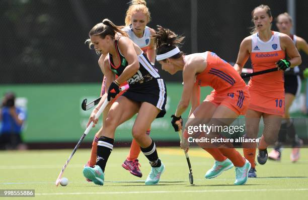July 2018, Germany, Gruenwald near Muenchen: Women's hockey match between Germany and The Netherlands at the Freizeitpark. Anne Schroeder of Germany...
