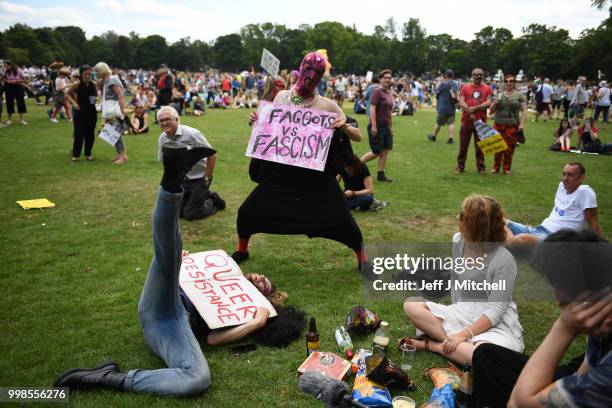 People hold anti-Trump signs while the U.S. President is visiting Trump Turnberry Luxury Collection Resort in Scotland as people gather to protest...