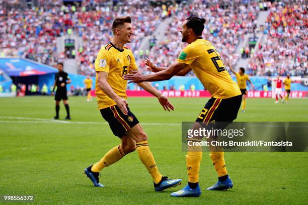 Thomas Meunier of Belgium celebrates with teammate Nacer Chadli after scoring his sides first goal during the 2018 FIFA World Cup Russia 3rd Place...