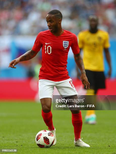 Raheem Sterling of England runs with the ball during the 2018 FIFA World Cup Russia 3rd Place Playoff match between Belgium and England at Saint...