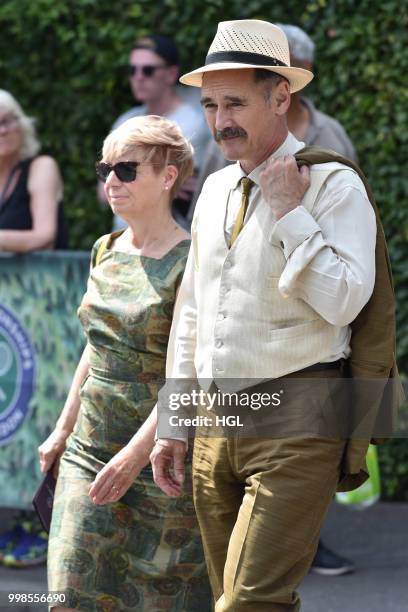 Mark Rylance and Claire van Kampen seen outside Wimbledon AELTC on July 14, 2018 in London, England.