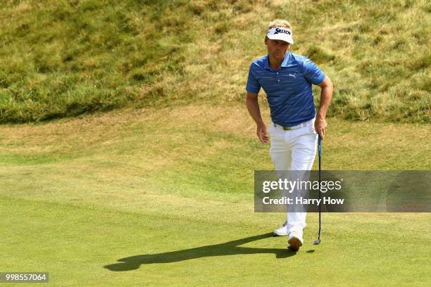 Soren Kjeldsen of Denmark reacts to a missed putt on hole one during day three of the Aberdeen Standard Investments Scottish Open at Gullane Golf...