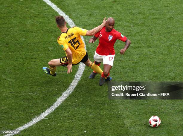 Thomas Meunier of Belgium tackles Fabian Delph of England during the 2018 FIFA World Cup Russia 3rd Place Playoff match between Belgium and England...