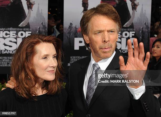 Producer Jerry Bruckheimer and wife Linda Bruckheimer pose on the red carpet as they arrive for the premiere of "Prince of Persia: The Sands of Time"...