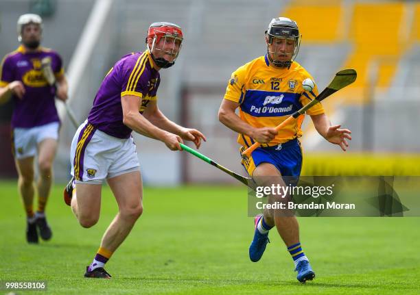 Cork , Ireland - 14 July 2018; David Reidy of Clare in action against Diarmuid O'Keeffe of Wexford during the GAA Hurling All-Ireland Senior...