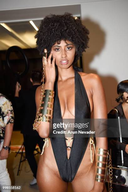 Model poses backstage at Miami Swim Week powered by Art Hearts Fashion Swim/Resort 2018/19 at Faena Forum on July 13, 2018 in Miami Beach, Florida.