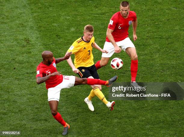 Fabian Delph and Eric Dier of England challenge Kevin De Bruyne of Belgium during the 2018 FIFA World Cup Russia 3rd Place Playoff match between...