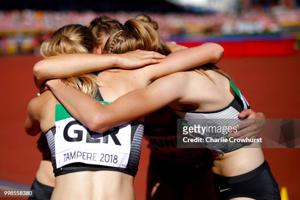 Denise Uphoff, Sophia Junk, Victoria Donicke and Corinna Schwab of Germany celebrate after winning gold in the final of the women's 4x100m on day...