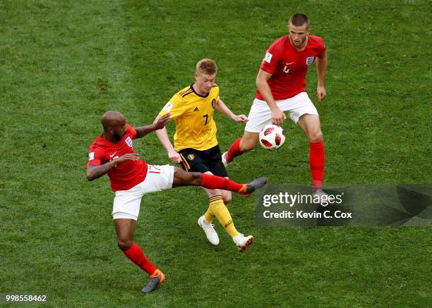 Fabian Delph and Eric Dier of England challenge Kevin De Bruyne of Belgium during the 2018 FIFA World Cup Russia 3rd Place Playoff match between...