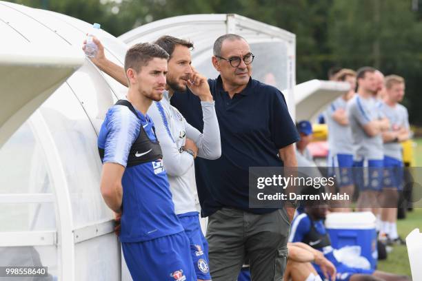 Maurizio Sarri of Chelsea with Carlo Cudicini and Jorginho during a training session at Chelsea Training Ground on July 14, 2018 in Cobham, England.