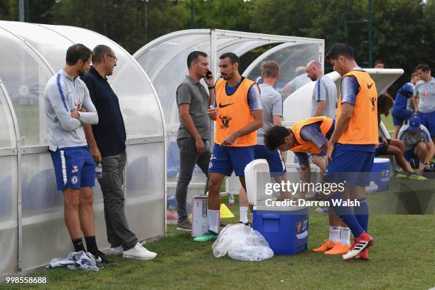 Maurizio Sarri of Chelsea with Carlo Cudicini and Davide Zappacosta during a training session at Chelsea Training Ground on July 14, 2018 in Cobham,...