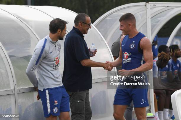Maurizio Sarri of Chelsea with Carlo Cudicini and Ross Barkley during a training session at Chelsea Training Ground on July 14, 2018 in Cobham,...
