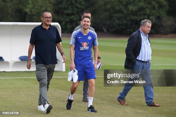 Maurizio Sarri and Jorginho of Chelsea after a training session at Chelsea Training Ground on July 14, 2018 in Cobham, England.