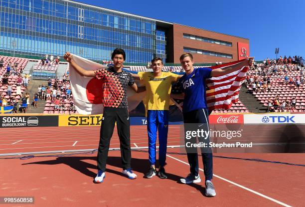 Masaki Ejima of Japan, Armand Duplantis of Sweden and Zachery Bradford of The USA celebrate winning medals in the final of the men's pole vault on...