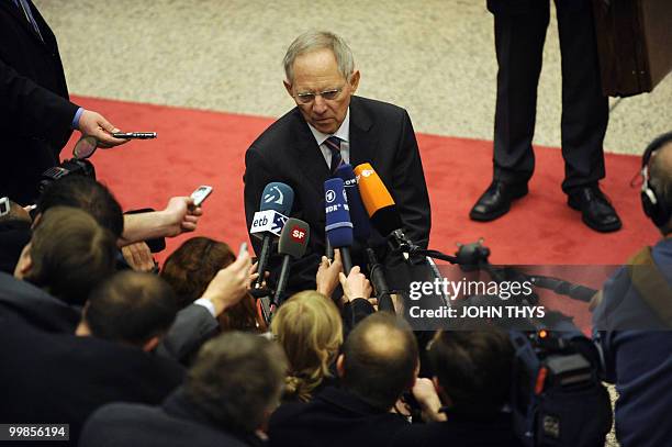German Finance Minister Wolfgang Schaeuble listens to journalists questions prior to the Economic and Financial Affairs meeting on May 18, 2010 at...