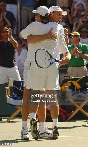 Todd Woodbridge and Wayne Arthurs of Australia celebrate victory over Magnus Larsson and Jonas Bjorkman of Sweden in the Davis Cup Semi Final match...