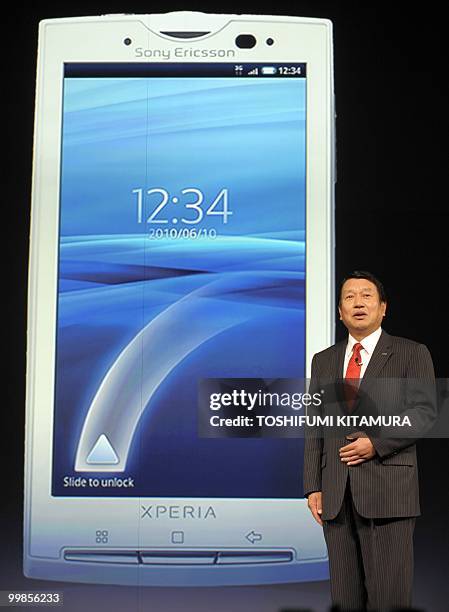 Japanese mobile operator NTT DoCoMo President Ryuji Yamada introduces the company's new smartphone line ups including the recent Sony Ericsson's...