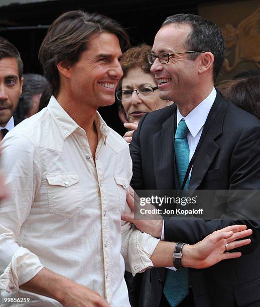 Actor Tom Cruise and CAA talent agent Richard Lovett attend the Handprint And Footprint Ceremony Honoring Producer Jerry Bruckheimer at Grauman's...