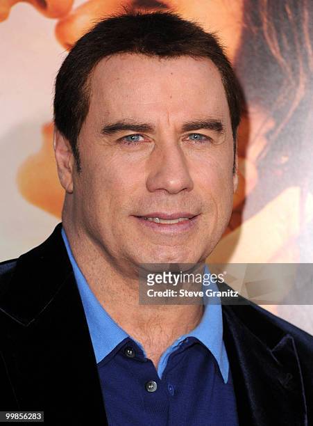 John Travolta attends the "The Last Song" Los Angeles Premiere at ArcLight Hollywood on March 25, 2010 in Hollywood, California.