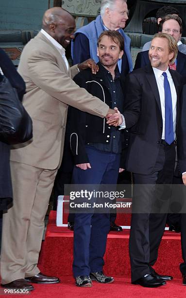Actors Michael Clarke Duncan, Billy Bo Thornton and Nicolas Cage pose at the Handprint And Footprint Ceremony Honoring Producer Jerry Bruckheimer at...
