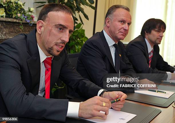 Bayern Munich's Franck Ribery seats beside Bayern chairman Karl-Heinz Rummenigge and the lawyer of the club as he appeared at the Court of...